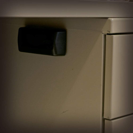 sliding cover with built-in stop to prevent loss or damage